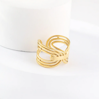 Gold ring on a white background