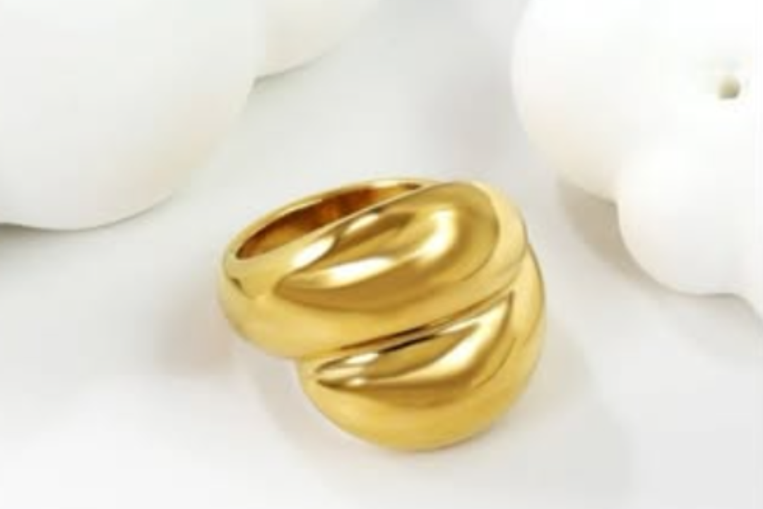 Gold ring on a white background